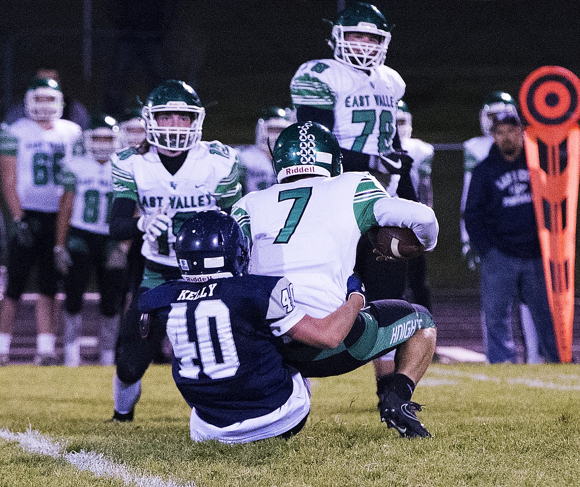 LOREN BENOIT/Press
Lake City&#146;s Devin Kelly sacks East Valley quarterback Christian Johnston on Friday night at Lake City.