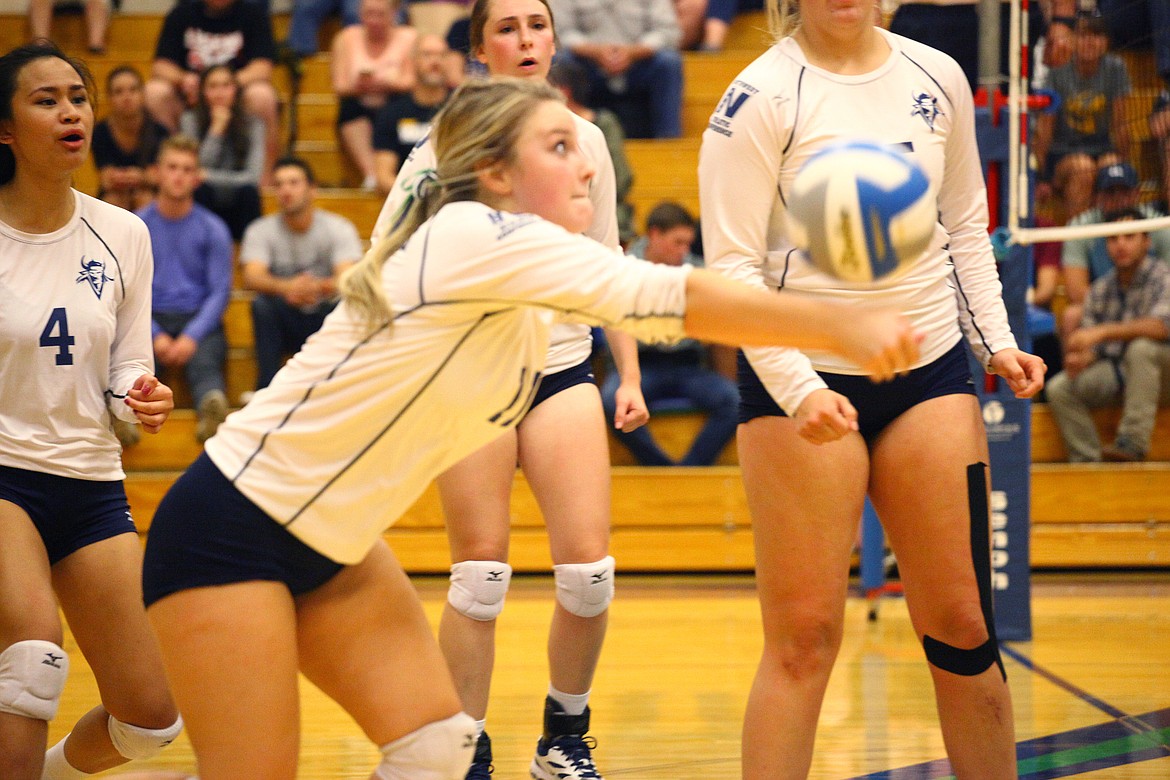 Rodney Harwood/Columbia Basin HeraldBig Bend setter Savannah Bass (11) scrambles for a dig during the second set of Wednesday night's NWAC East match with Walla Walla Community College. The Warriors won in three sets.