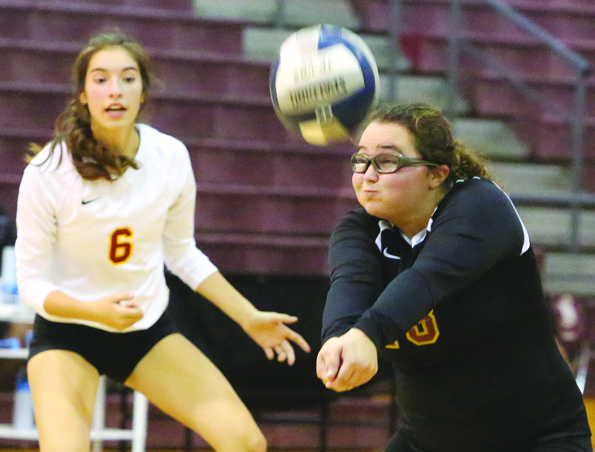 Connor Vanderweyst/Columbia Basin Herald
Moses Lake's Krista Hutsell fields a serve from Wenatchee.