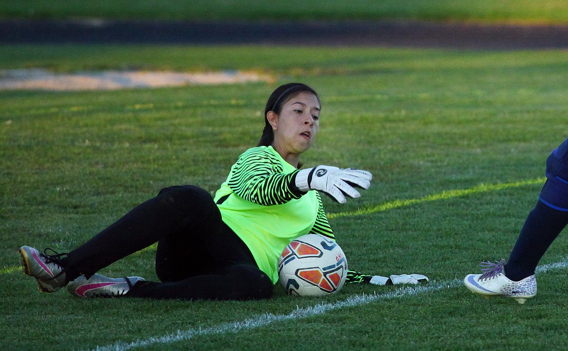 Rodney Harwood/Columbia Basin Herald
Othello goalkeeper Giselle Monroy slides to make a save during Tuesday's CWAC match with Ellensburg. Monroy finished with two saves on the night.