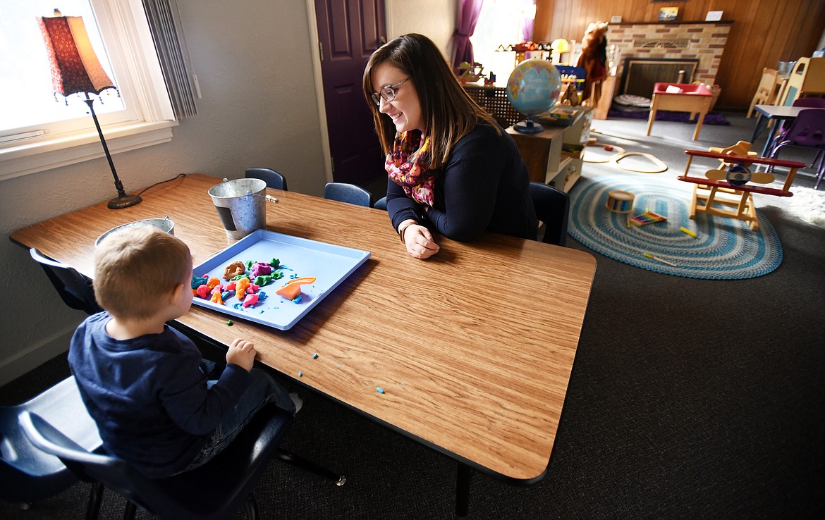 Lisa Bell, co-director and co-owner of Marlyn&#146;s Center For Children &amp; Families, plays with 2-year-old Braxton Lake.