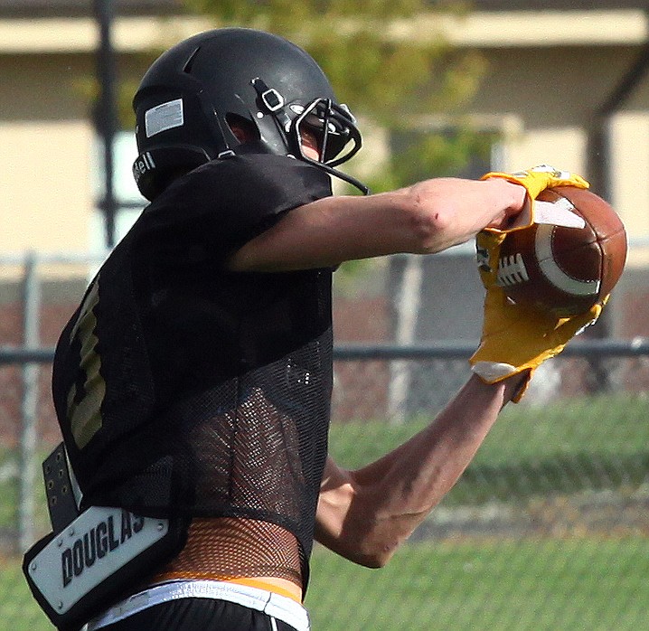 Rodney Harwood/Columbia Basin HeraldRoyal senior Corbin Christensen hauls in a ball during practice. Christensen had two caches for 99 yards and two touchdowns against College Place.