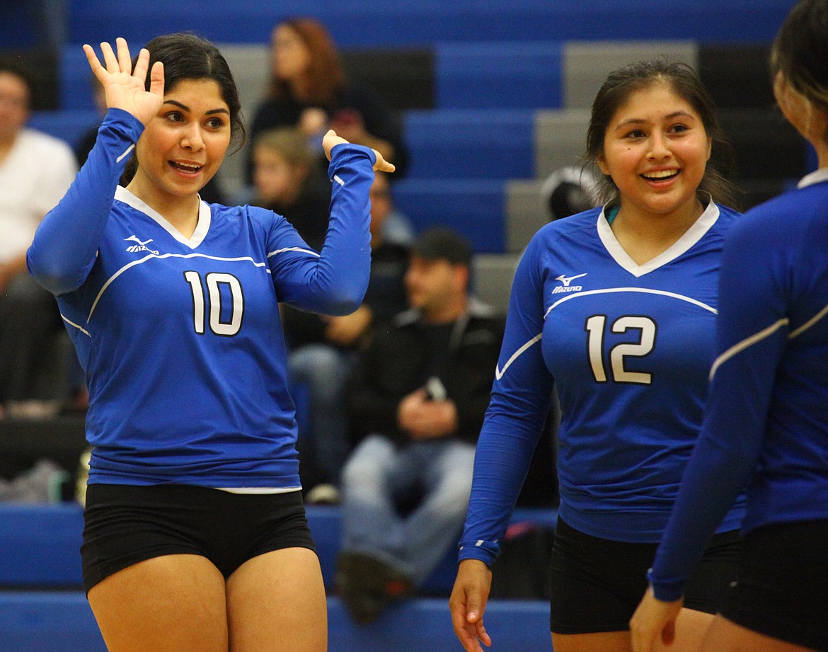 Rodney Harwood/Columbia Basin HeraldWarden outside hitter Jizelle Pruneda (10) reacts to the Cougars scoring a point during the third set of Thursday night's SCAC match with Wahluke.