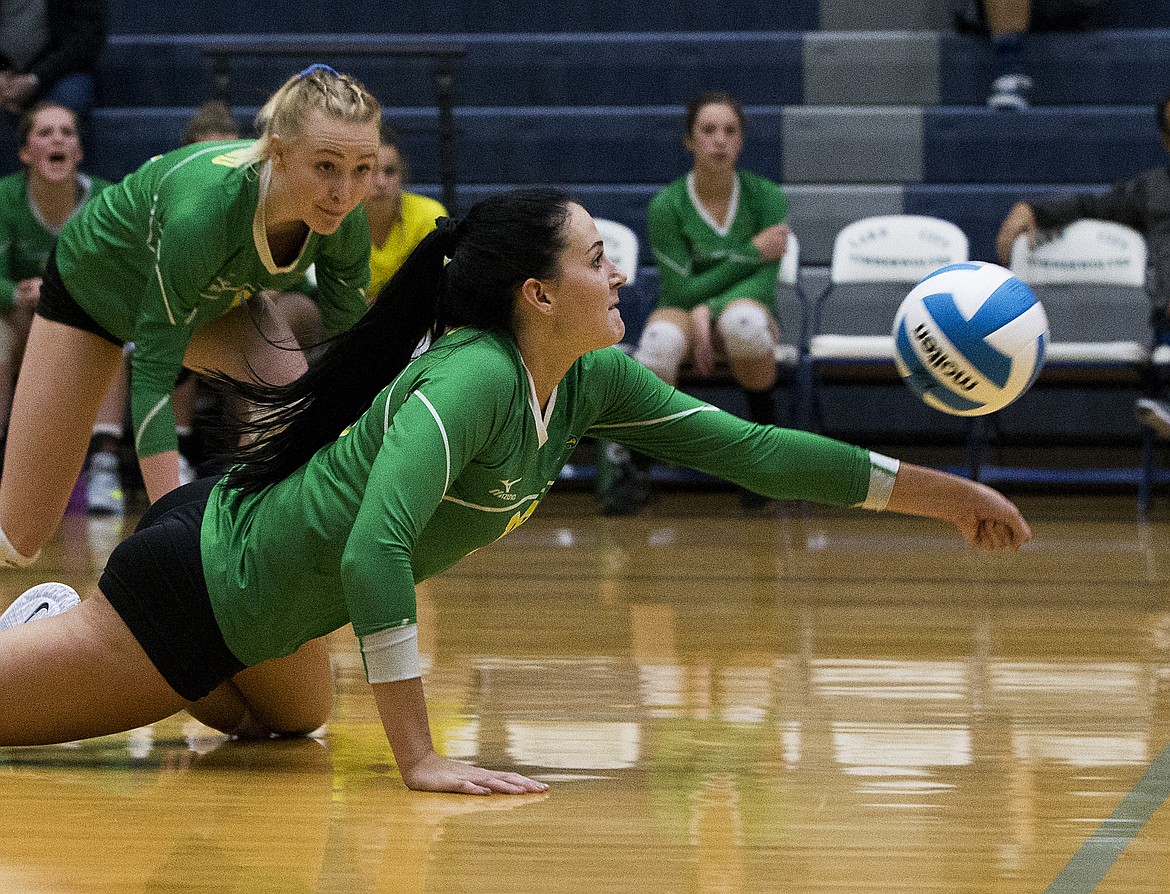 LOREN BENOIT/Press
Lakeland&#146;s Mattisyn Cope lays out for the volleyball in a match against Lake City on Tuesday night.