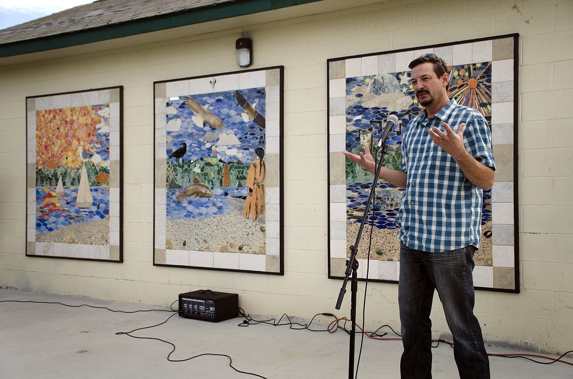 Polson High School art teacher Matt Holmes explains the process behind the creation of the new mosaic at Riverside Park. (Jeremy Weber/Lake County Leader)