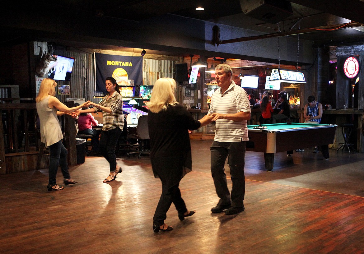 Dancers practice dance movements at the Remington Bar in Whitefish. (Mackenzie Reiss/This Week in the Flathead)