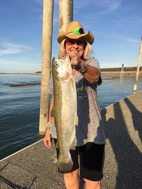 Pete Fisher photo - Vicki Wenger with a nice dock trout.