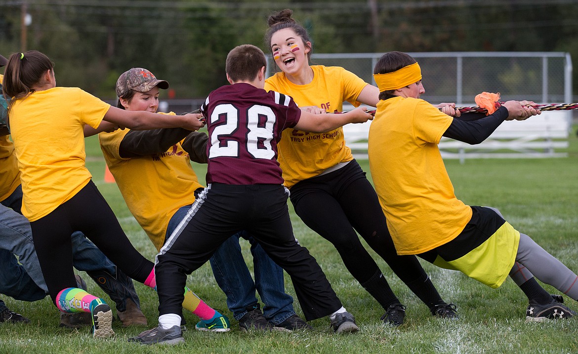 Troy High School freshman compete in a tug of war contest at a Wednesday evening homecoming event. See more photos on page B1. (John Blodgett/The Western News)
