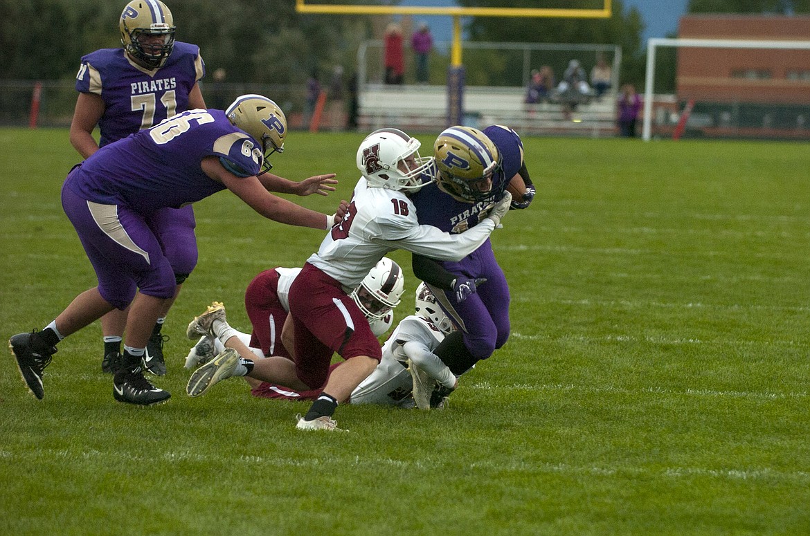 Polson&#146;s Kyle Druyvestein carries the ball in the first quarter at home against Hamilton Friday. (Jeremy Weber photo)