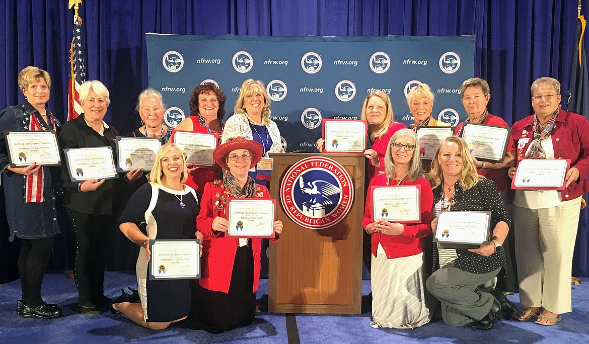 (Courtesy photo)
Idaho Federation of Republican Women represented at the 39th NFRW Biennial Convention pose for a photo. Pictured in the back row, from left, are Tracey Wasden, Canyon County Republican Women delegate; Rep. Thyra Stevenson, Nez Perce Republican Women delegate; Elaine Vogeler, Magic Valley Republican Women alternate; VCRW President Cec Tyler, Valley County Republican Women delegate; IFRW President Charlene Matheson, Idaho Federation of Republican Women; Kitty Kunz, Ada County Republican Women delegate; MVRW Billee Dinges, Idaho Federation of Republican Women delegate; CCRW Joan Mason, Idaho Federation of Republican Women delegate; and MVRW President Marie Silver, Magic Valley Republican Women delegate. Pictured in the front row, from left, are KCRWF President Teri Duke, Kootenai County Republican Women Federated delegate; NIFRW President Mary Jo Ambrosiani, North Idaho Federated Republican Women delegate; CCRW President Shirlayne Corder, Canyon County Republican Women delegate; and CCRW Theresa Bradford, Idaho Federated Republican Women alternate. Not pictured are Idaho Federation of Republican Women delegate, JCRW Coleen Erickson; and Jefferson County Republican Women Delegate, JCRW President Kaye Field.