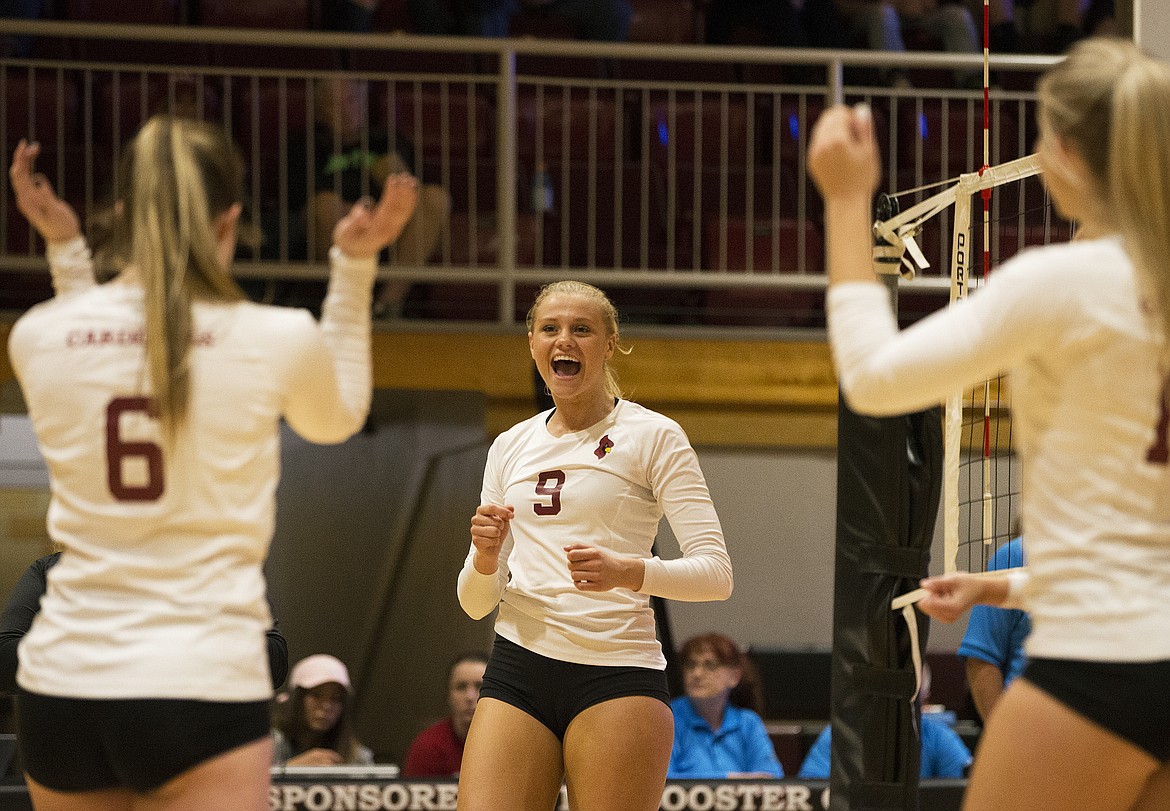 LOREN BENOIT/Press

NIC&#146;s Kayla Neumann celebrates a point with her teammates in a match against Community Colleges of Spokane last Wednesday evening at NIC.