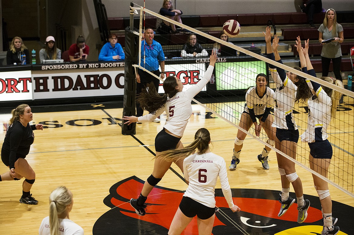 LOREN BENOIT/Press
NIC&#146;s Harley Cope tips the ball over the net against Community Colleges of Spokane last Wednesday.