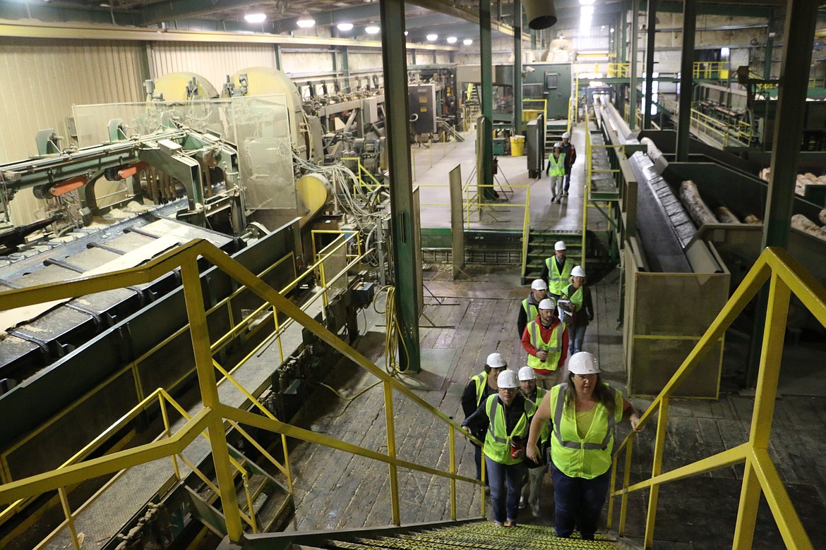 (Photo by MARY MALONE)
Sandpoint High School teachers and staff geared up for a tour of Idaho Forest Group&#146;s Laclede mill Thursday during the school&#146;s Community Connections tour.