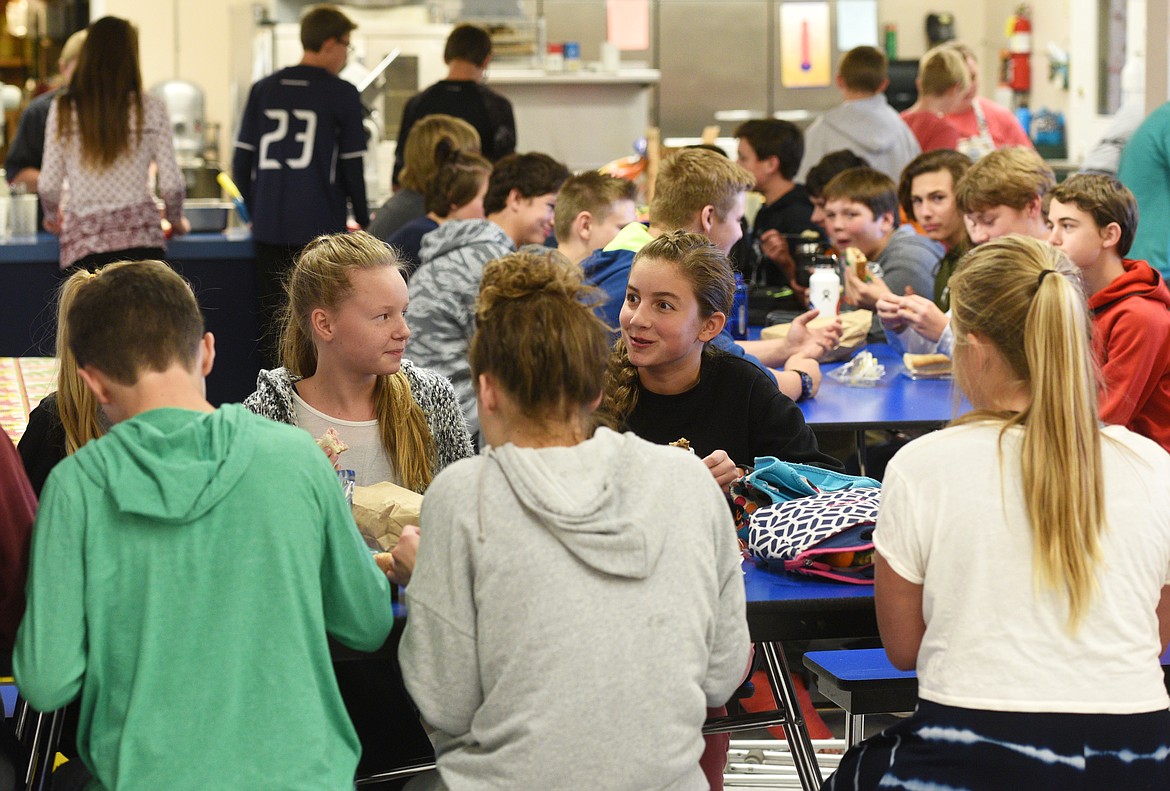 Students crowd into the cafeteria during lunch at Somers Middle School on Thursday. (Aaric Bryan/Daily Inter Lake)