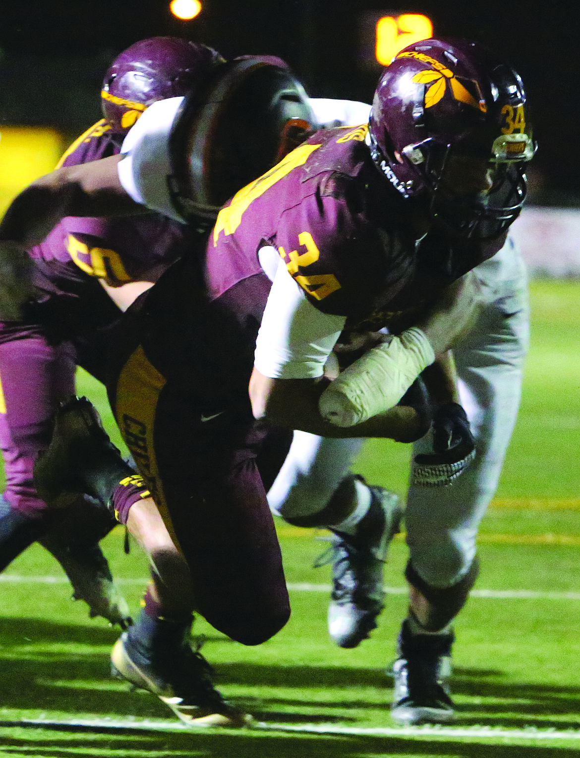 Connor Vanderweyst/Columbia Basin Herald
Moses Lake running back Mason Campos dives into the end zone for a touchdown.