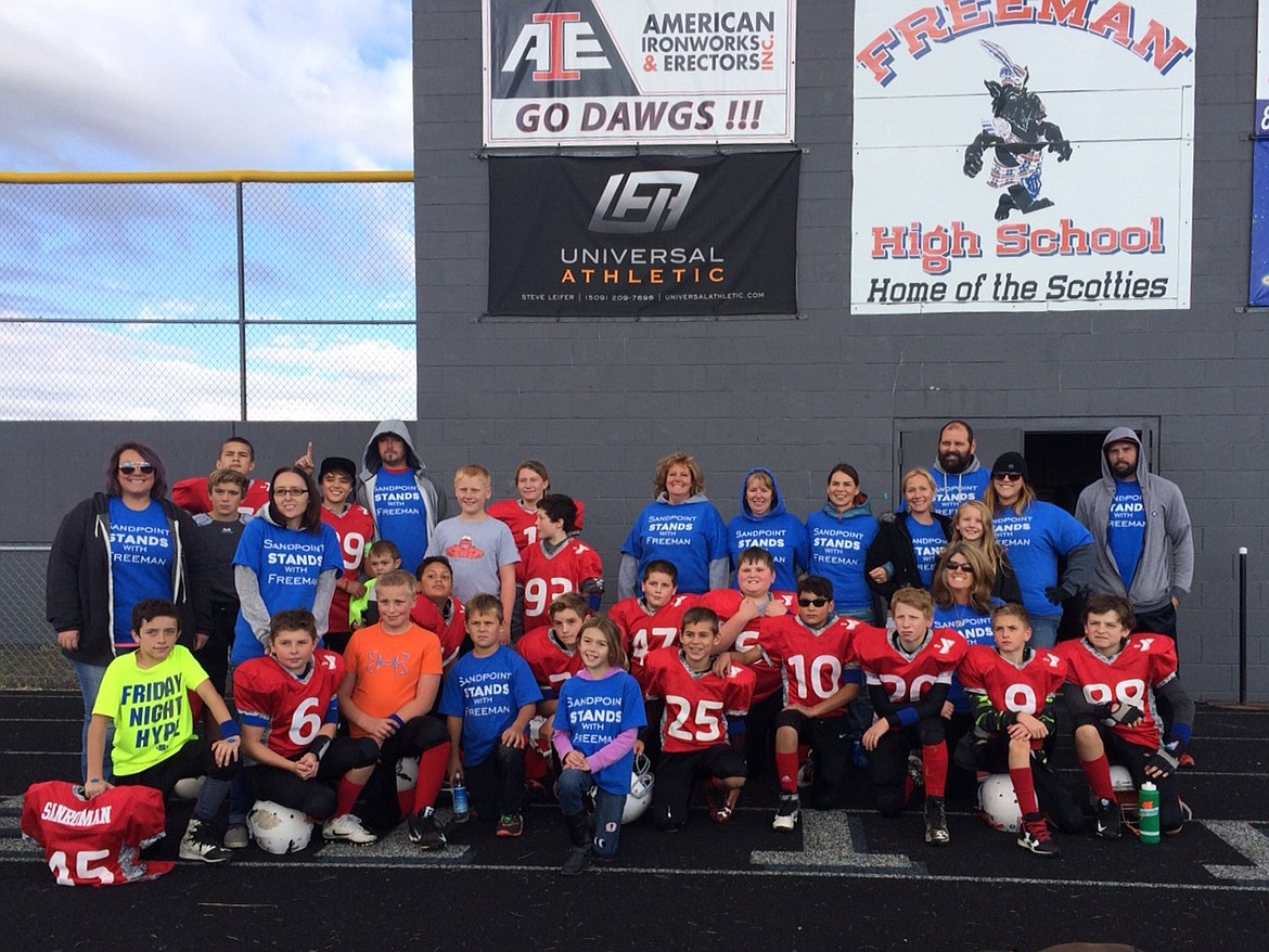 (Courtesy photo)
The Sandpoint Grid Kids YMCA junior Bulldog football team played Freeman at Freeman High School recently. To show their support for the school, Sandpoint players all wore blue wristbands and some fans wore Sandpoint stands with Freeman T-shirts. Sandpoint won the game 30-0.