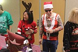 Bad clothes, good cause Ugly sweaters bring Boys and Girls Club supporters together