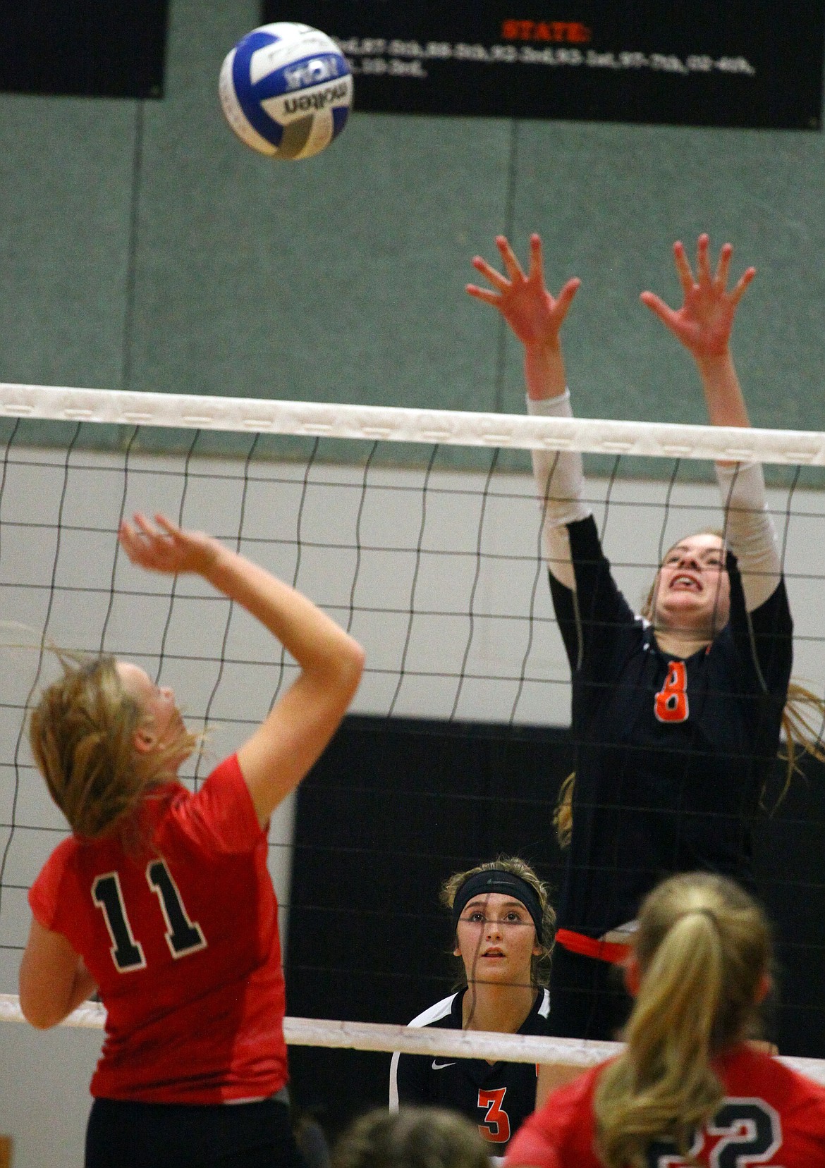 Rodney Harwood/Columbia Basin Herald
Ephrata's Laura Davis tries to block a spike from Othello's Alyssa Freeman (11).