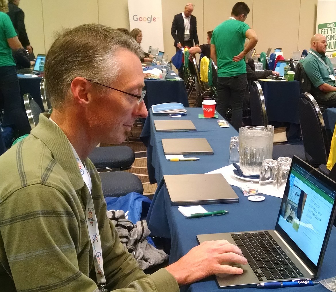 BRIAN WALKER/Press
Illustrator Colin Hayes participates in a free Google workshop on Monday at The Coeur d&#146;Alene Resort. The workshop assisted local small businesses with an online presence.