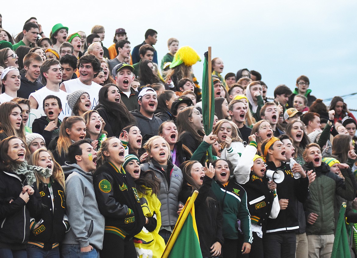 The Whitefish High School student section cheers for the Dogs during Friday night&#146;s homecoming game against Polson. (Daniel McKay/Whitefish Pilot)