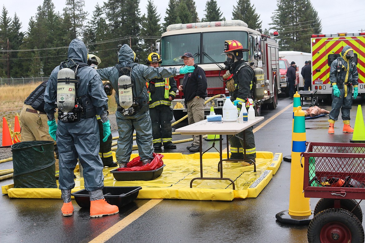 Photo by Mandi Bateman
decontamination exercise taking place in the rain.