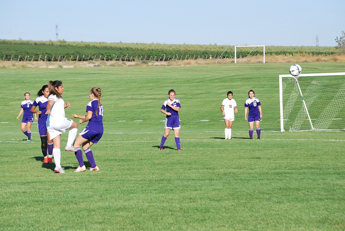 Bob Kirkpatrick/The Sun Tribune - Yecsemari Gutierrez's shot sails wide of its mark.