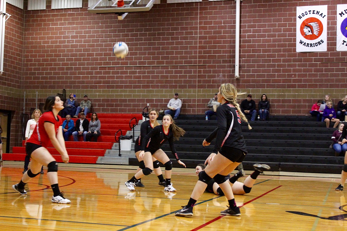 Photos by Chanse Watson/
After a desperation dive by Maggie Howard saves the play, Destiny Angle sends the ball back to the Kootenai side.