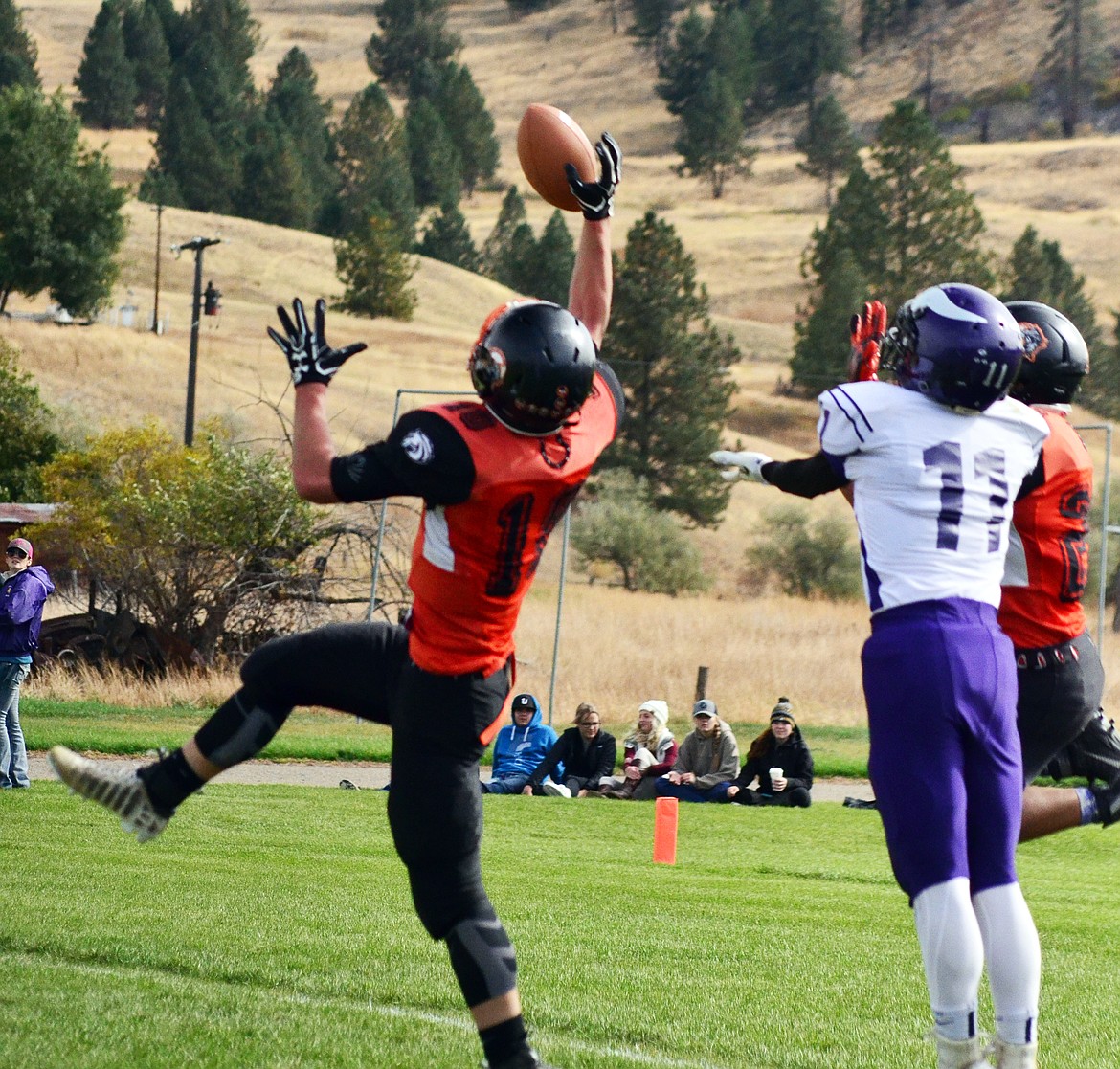 Tanner Orvitt(10) gets the interception for control of the ball. (Erin Jusseaume/ Clark Fork Valley Press)