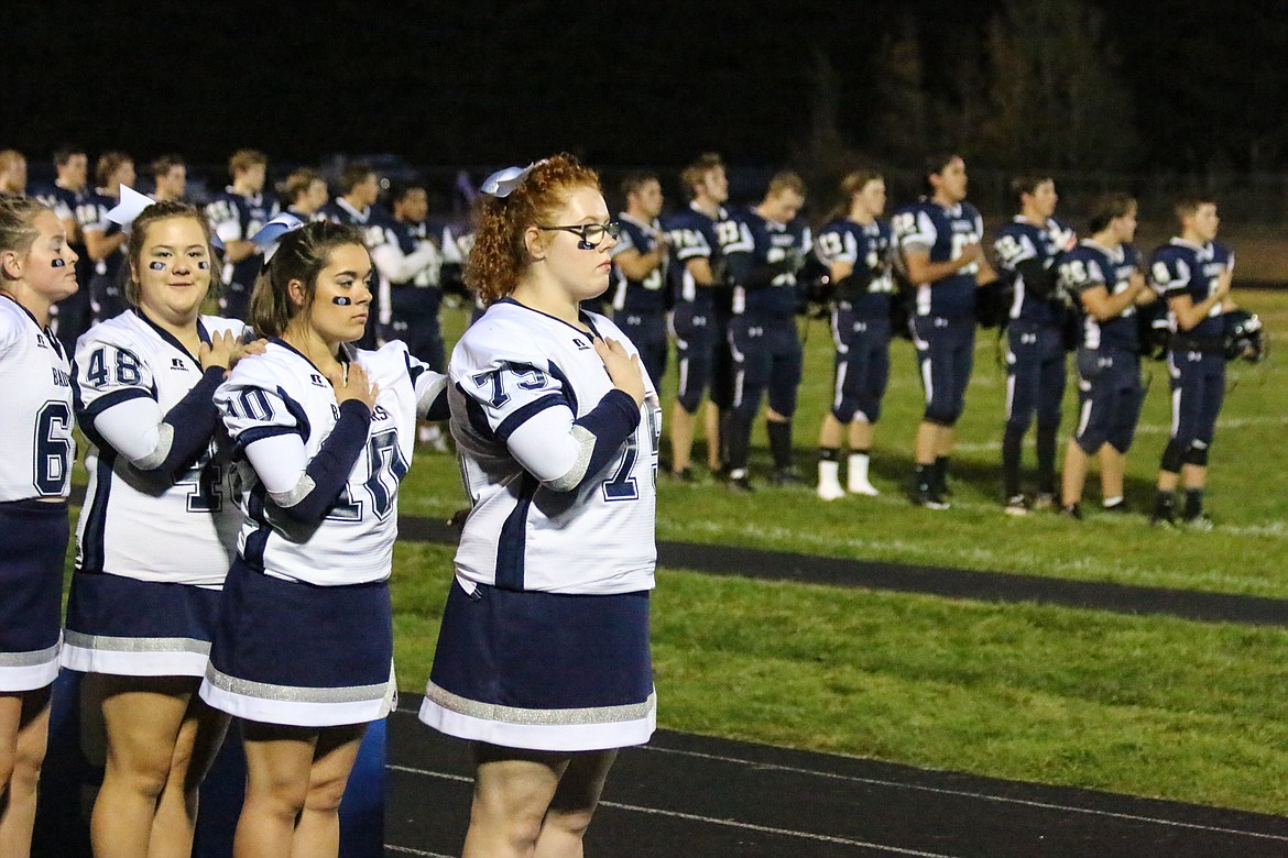 Photo by Mandi Bateman
The Badger football team and cheerleaders stand for the National Anthem.