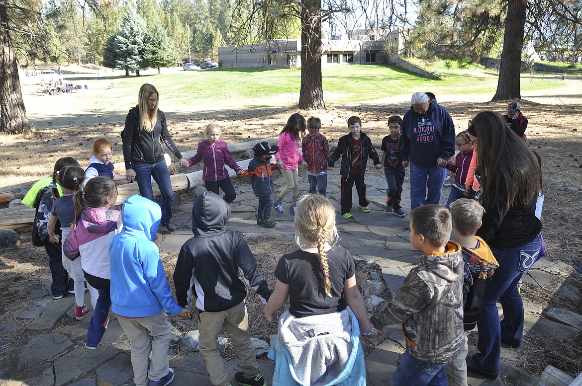 Patrick Matt, Jr. beats on a drum after showing second grade students from Ronan a tribal dance last week at The People&#146;s Center. (Ashley  Fox/Lake County Leader)