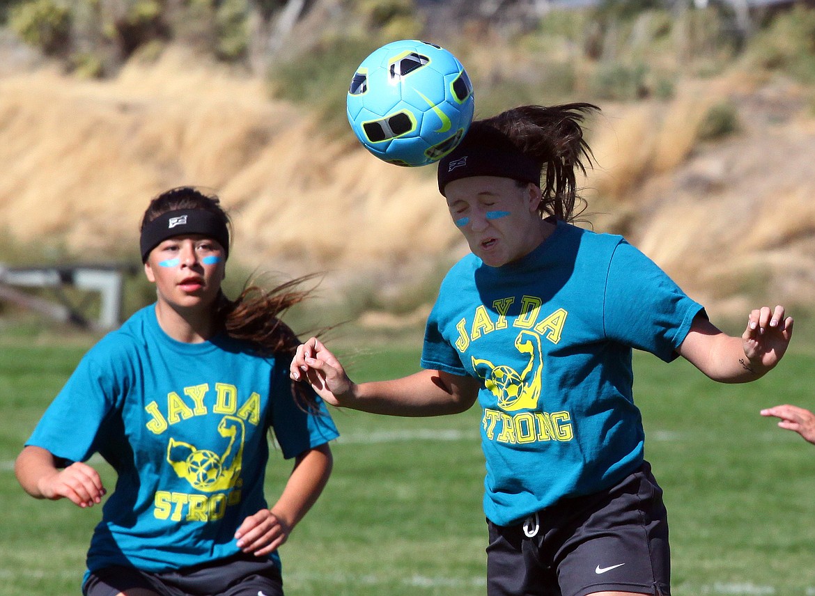 Rodney Harwood/Columbia Basin HeraldEphrata midfielder Amidy Gallagher gets a head on a ball during the second half of the CWAC game against Grandview Saturday afternoon.