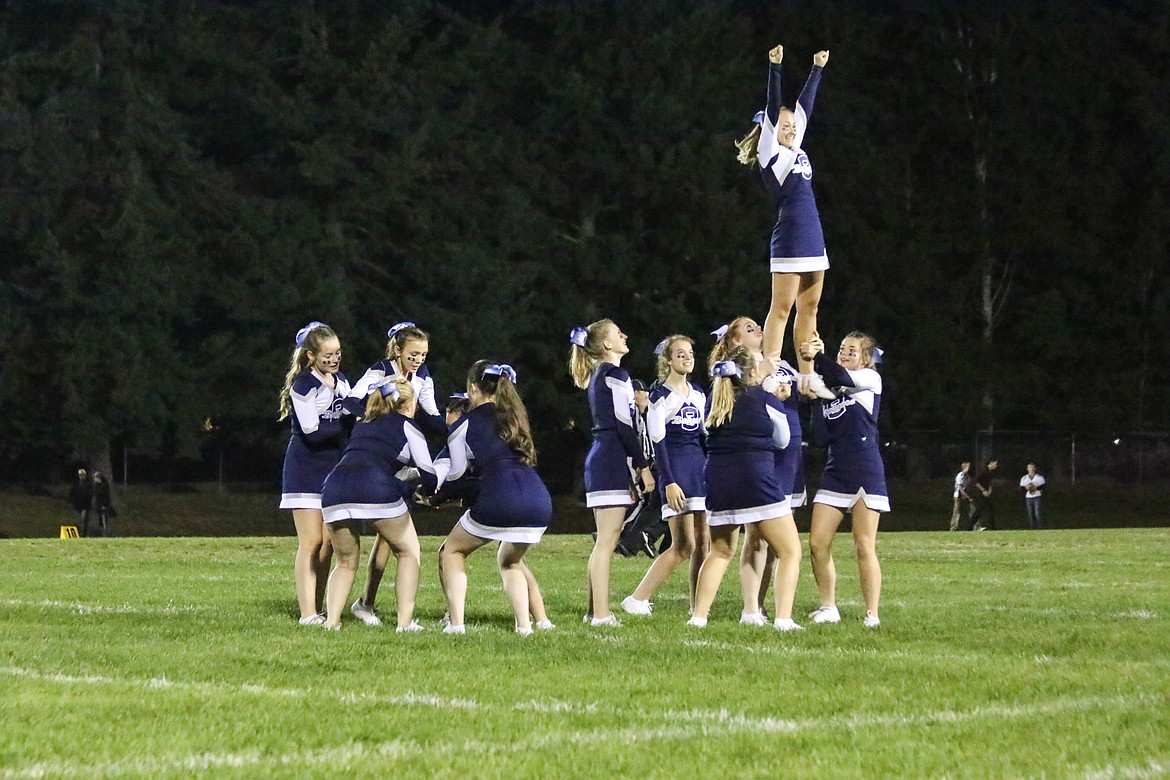 Photo by Mandi Bateman
Cheerleaders performing halftime routine.