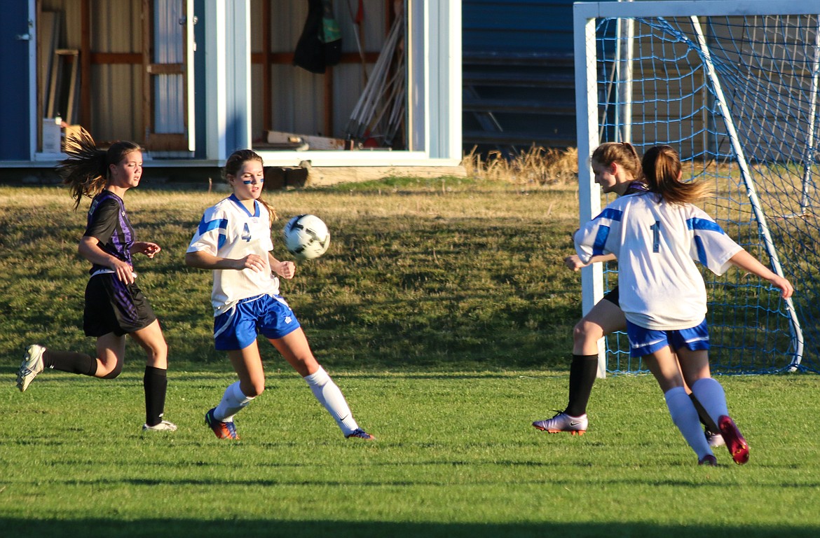 Freshman Holly Ansley controls the ball in traffic.