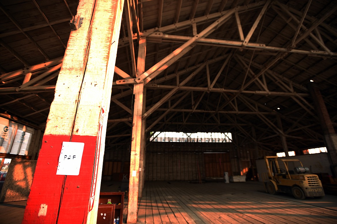 A beam in the Kalispell Lumber Company stands with a note indicating its position. The building is being carefully deconstructed by Heritage Timber LLC of Missoula and will be reassembled at its new location.(Brenda Ahearn/Daily Inter Lake)