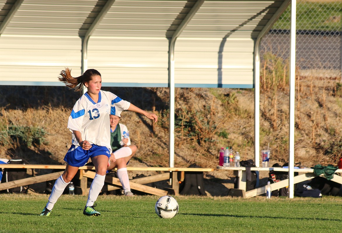 Freshman Makayla Mierke prepares to send the ball to a teammate.