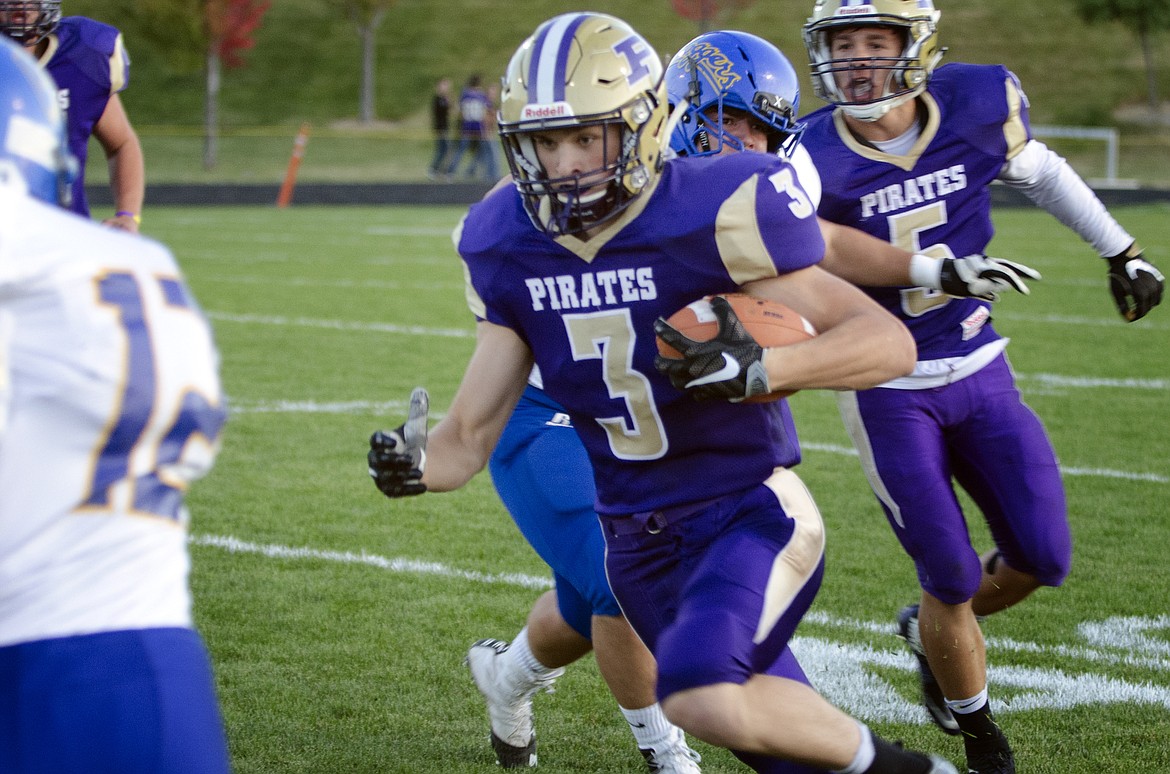 COLTON COTE (3) cuts up the field for a big gain in the first quarter against the Loggers Friday. Cote led the Pirate rushing attack in the win with 69 yards. (Jeremy Weber/Lake County Leader)