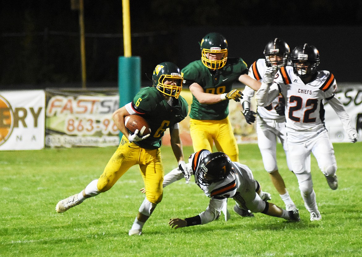 Jack Eisenbarth returns an interception in the fourth quarter of Whitefish's 24-23 victory over Ronan. (Daniel McKay/Whitefish Pilot)