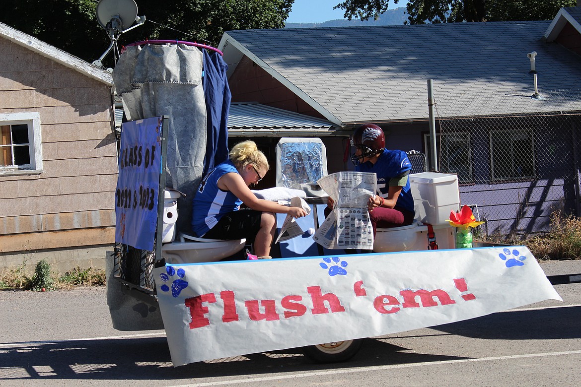 &#147;Flush &#146;em&#148; made an interesting statement on a float during the Alberton Homecoming Parade on Friday. (Photo by Jessica Maurer)