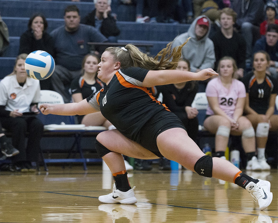 LOREN BENOIT/Press

Post Falls&#146; Courtney Finney stretches out to hit a volley during Tuesday night&#146;s 5A Region 1 Championship game at Lake City High School.