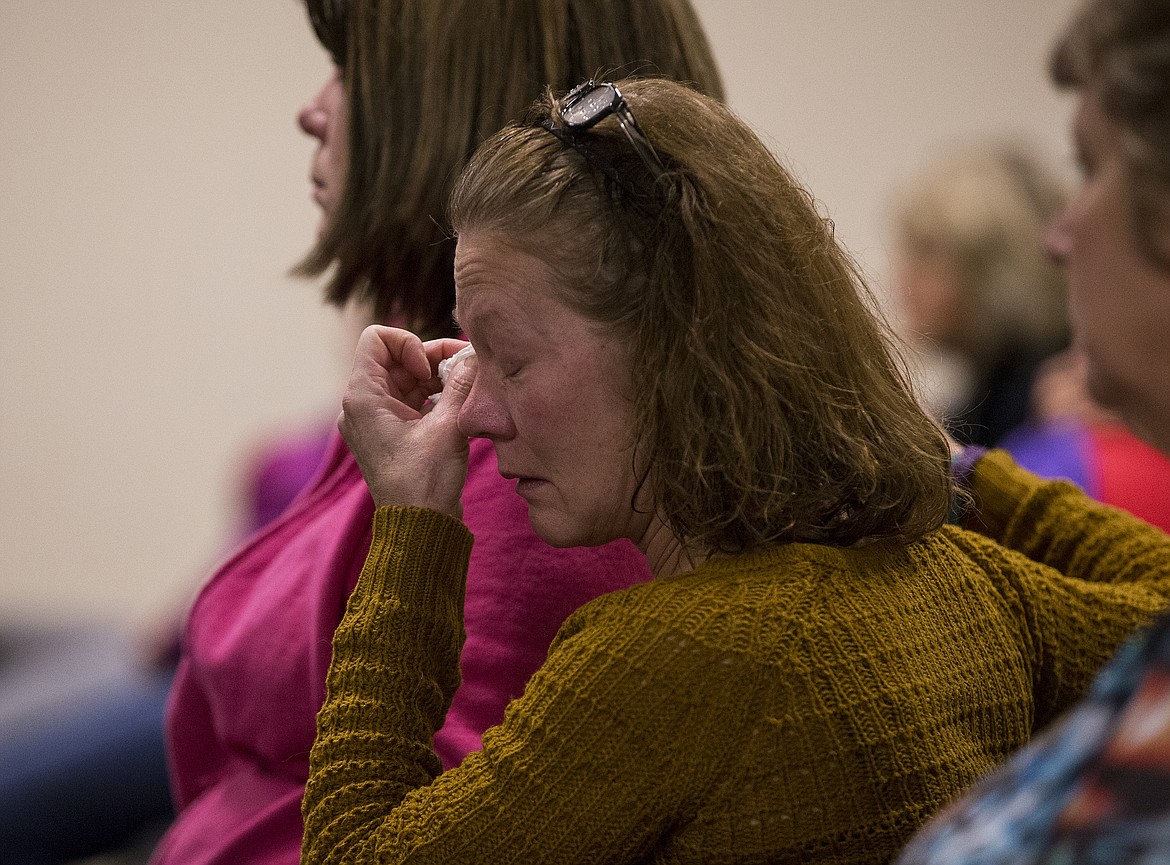 LOREN BENOIT/PressKim McCombs uses a tissue to wipe tears from her eyes as she recalls the life of her son Levi during a suicide suvival lecture on Friday at Kootenai Health.