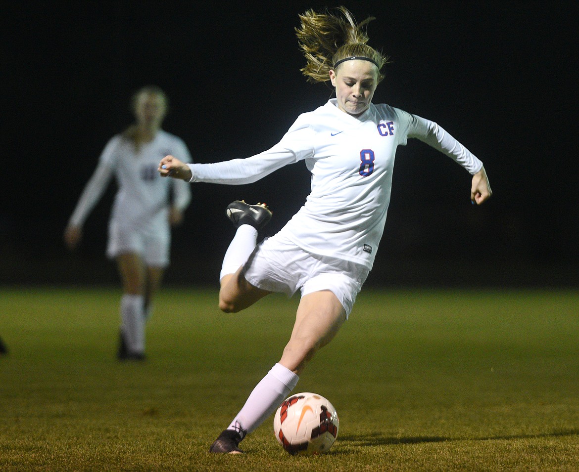 Columbia Falls defender Kailey Schrader clears the ball during the first half against Stevensville on Saturday. (Aaric Bryan/Daily Inter Lake)