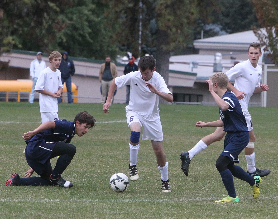 JASON ELLIOTT/Press
Timberlake midfielder Kobe Harris splits the Bonners Ferry defense during the championship match of the 3A District 1-2 boys soccer tournament on Thursday at Sunrise Rotary Soccer Fields in Rathdrum.