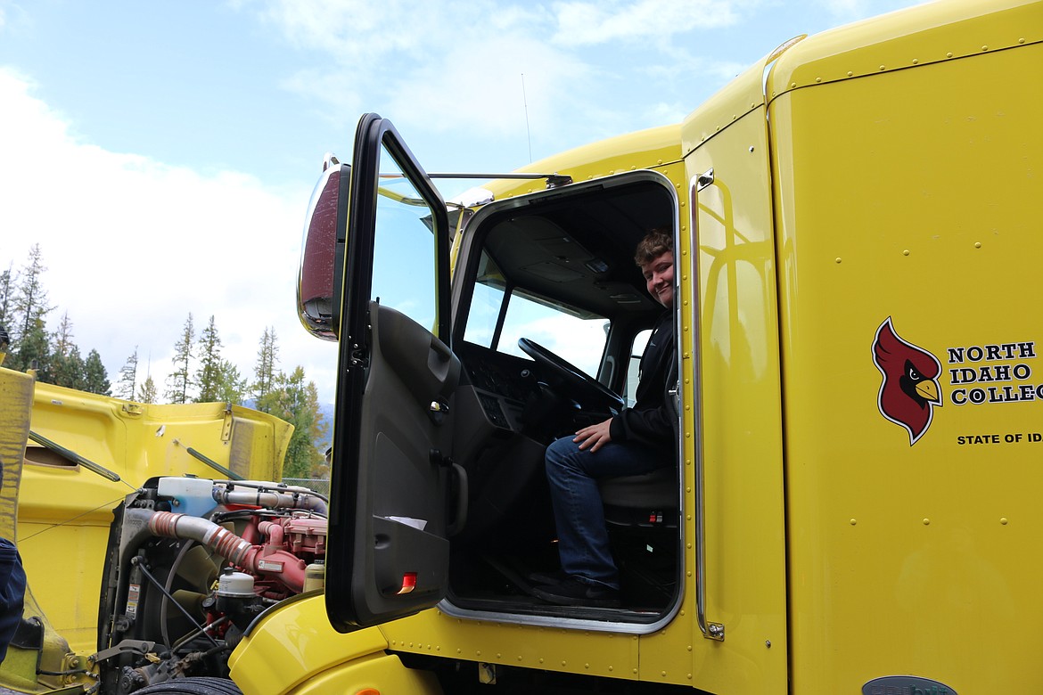 (Photo by ELAINA KIEBERT)
Wyatt Kayser, a Clark Fork High School freshman, checks out a diesel truck during North Idaho College&#146;s CTE Roadshow Friday at Sandpoint High School.