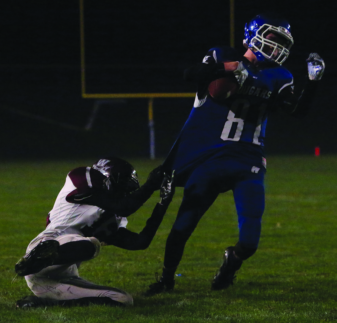 Connor Vanderweyst/Columbia Basin Herald
Warden wide receiver Kaden Skone tries to shake off a Wahluke tackler.