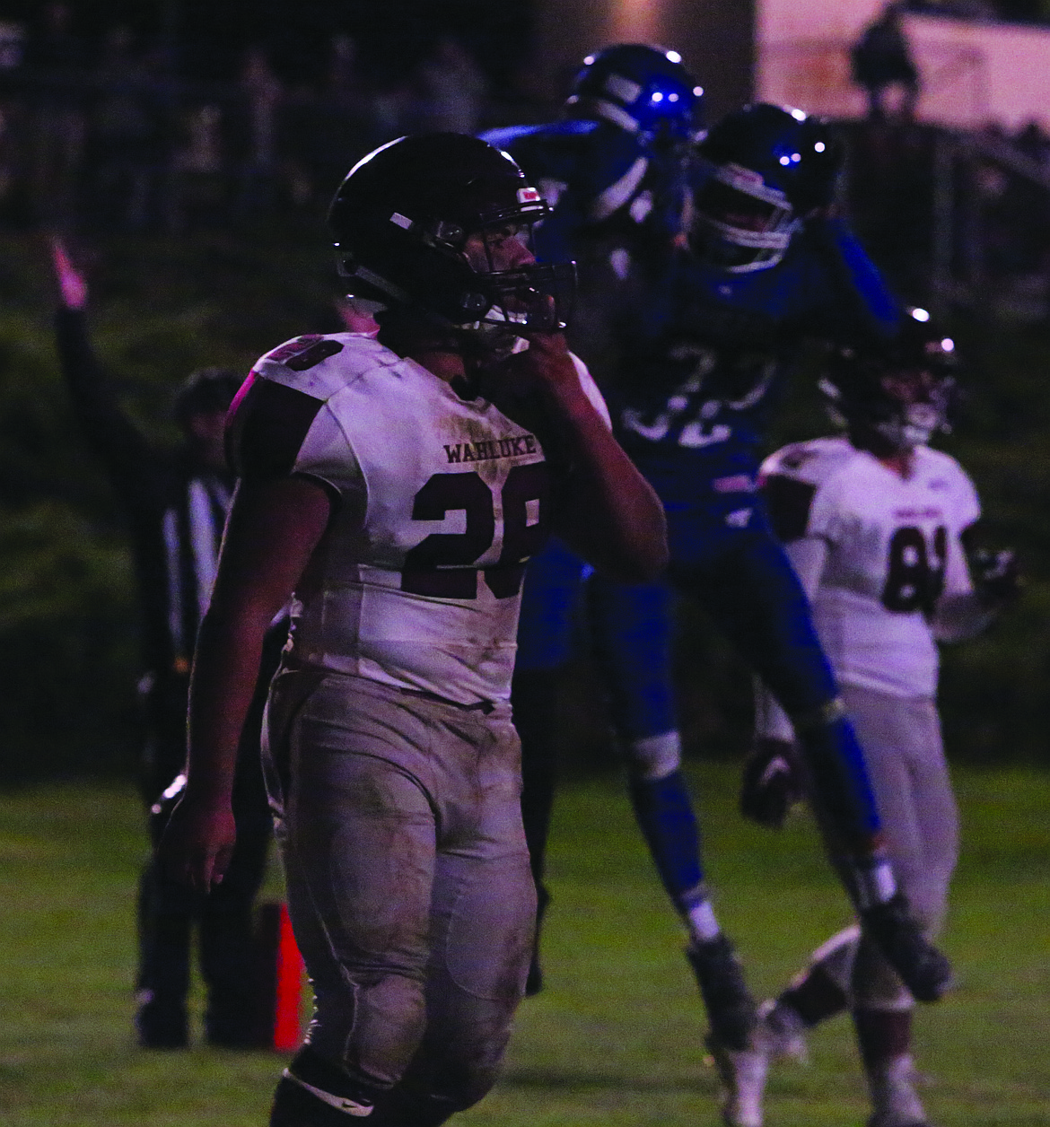 Connor Vanderweyst/Columbia Basin Herald
Wahluke linebacker Eli Barajas (28) comes off the field after Warden scores a touchdown.