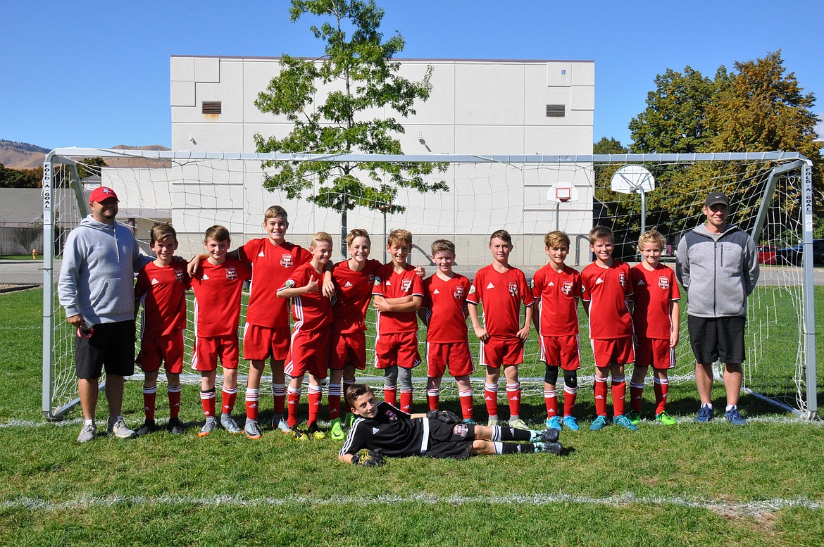 Courtesy photo
Members of the Sting Timbers FC &#145;06 Boys Red are, in the front, Braden Latscha; and standing from left, coach Matt Ruchti, Lachlan May, Ben Hannigan-Luther, Max Entzi, Haidyn Jonas, Jacob Molina, Zackery Cervi-Skinner, Connor Jump, Kason Pintler, Maximus Cervi-Skinner, Aidan Rice, Connor Mongan and assistant coach Mike Mongan.
&gt;