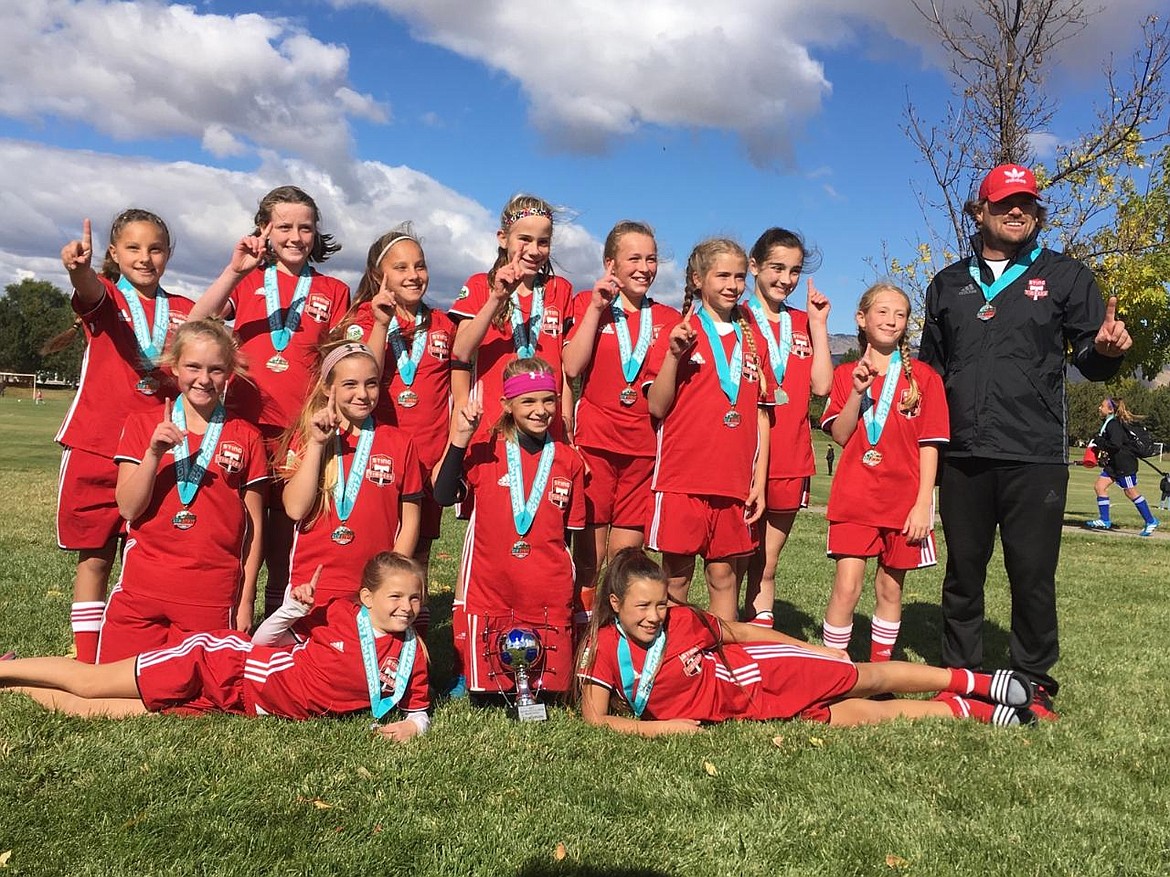 Courtesy photo
The Sting Timbers FC &#145;06 Girls Red soccer team took first in their division at the Gem State Challenge in Boise. On Saturday, the Sting beat FC Nova 2006 FCNOVA SB 4-0 on goals by Taylor Miller, Emerson Duncan (assist by Lucy Simpson), Devon Pirwitz, and Violet Andrews (assist by Lucy). The Sting beat Idaho Rush 06 Black 3-2 on goals by Violet Andrews (assist by Lucy Simpson, Madeline Daigle, and Taylor Miller. On Sunday, the Sting beat the Boise Nationals Timbers BNT 2006 11-0 on goals by Izabella Douglas (2 goals), Macie Lilyquist, Emily Medina, Jillian-Kate Scott, Devon Pirwitz (had 2 goals one assisted by Lucy Simpson), Emerson Duncan, Madeline Daigle, Violet Andrews (2 goals one assisted by Madeline Daigle, and the other assisted by Izabella Douglas). In the championship game, the Sting beat FC NOVA 07--JV 3-0 on goals by Emerson Duncan, Violet Andrews (Assist by Devon Pirwitz), and Devon Pirwitz. A cja-Lynn Scott had some great saves as goalie. Pictured above are Taylor Miller and Izabella Douglas (laying down); kneeling from left, Emerson Duncan, Emily Medina and Lucy Simpson; and standing from left, A caja-Lynn Scott, Alexa Sheppard, Jillian-Kate Scott, Devon Pirwitz, Macie Lilyquist, Violet Andrews, Madeline Daigle, Kaylie Smart and coach Julio Morales. Not pictured is Sally Gatten.