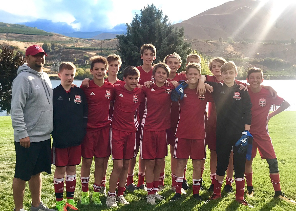 Courtesy photo
Members of the Sting Timbers FC &#145;03 Boys Red are, front row from left, coach Matt Ruchti, Tyler Gasper, Cooper Larson, Joseph Sarkis, Miles Jones, Walker Jump, Tyler Allred and River Engles; and back row from left, Noah Janzen, Connor Norris, Jack Shrontz, Zak Wenglikowski and Kohrt Weber.