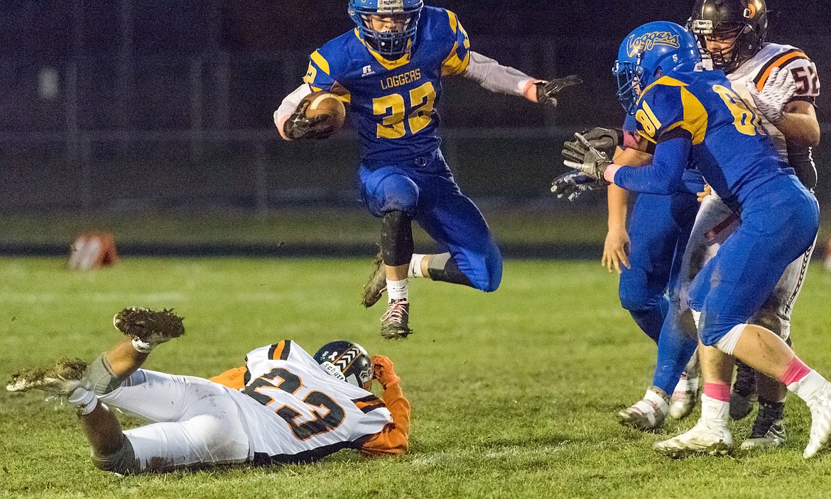 Libby&#146;s Drew Ginther evades an attempted tackle by Ronan&#146;s Elijah Durheim in a game in Libby Friday, Oct. 13.