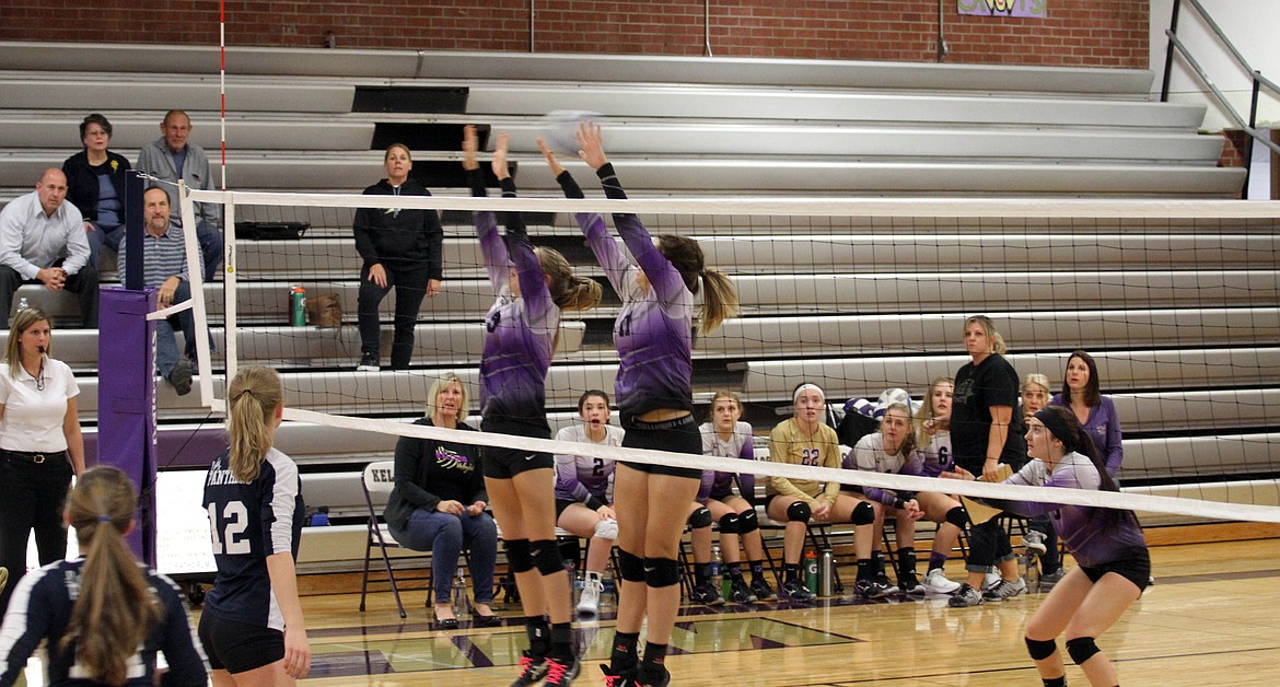 Caitlyn Wendt and Kat Rauenhorst provide some blocking for the Wildcats.